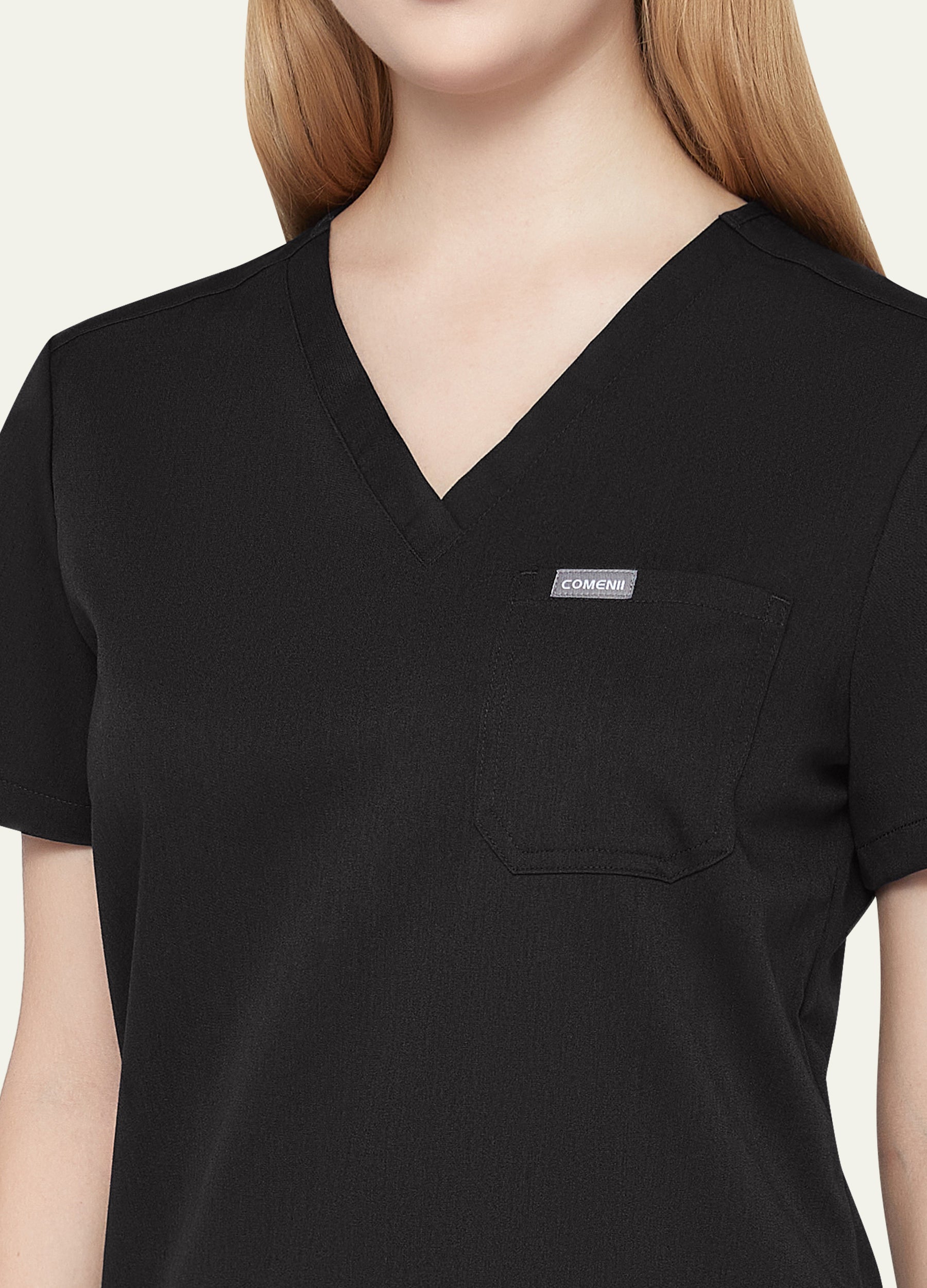 Blusa médica moderna con 1 bolsillo para mujer