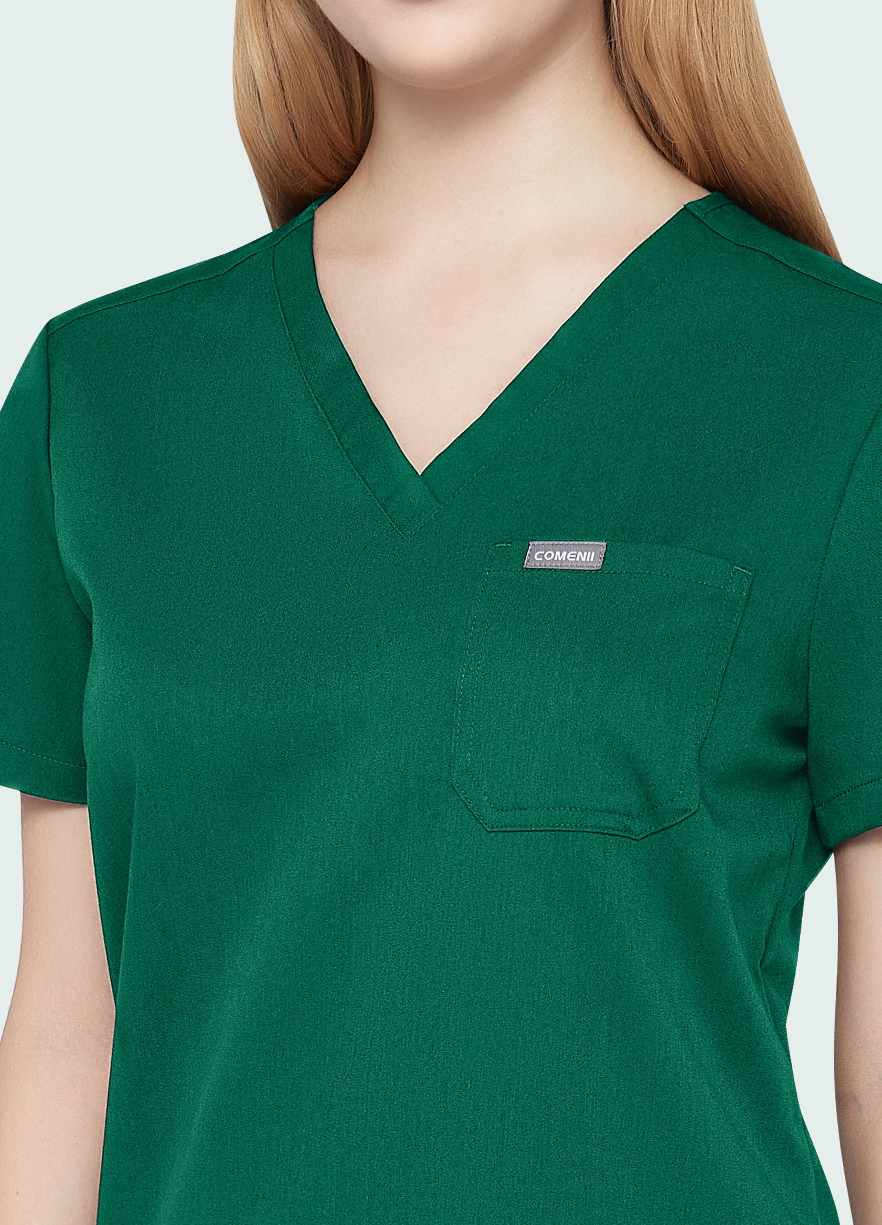 Blusa médica moderna con 1 bolsillo para mujer