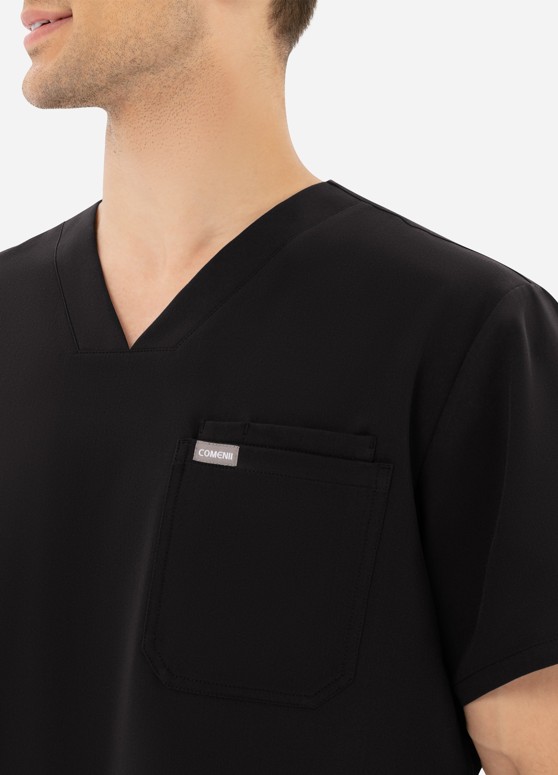 Blusa médica entallada con 2 bolsillos en el pecho para hombre