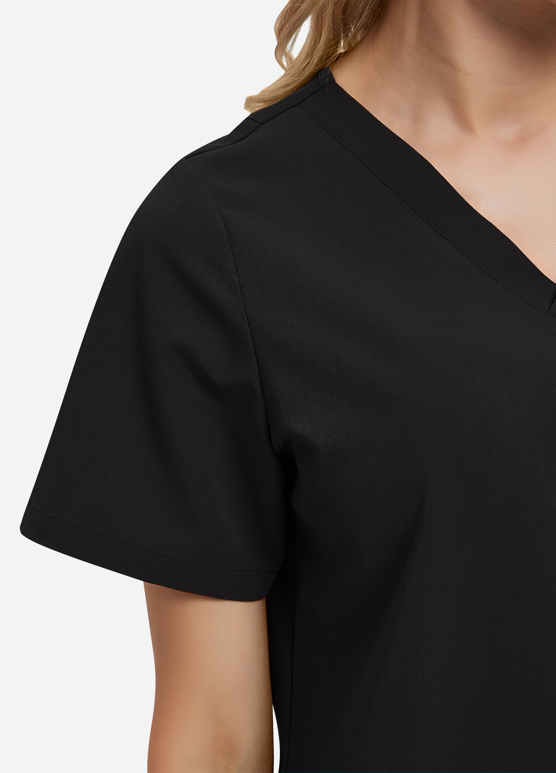 Blusa médica de 4 bolsillos con escote en V para mujer