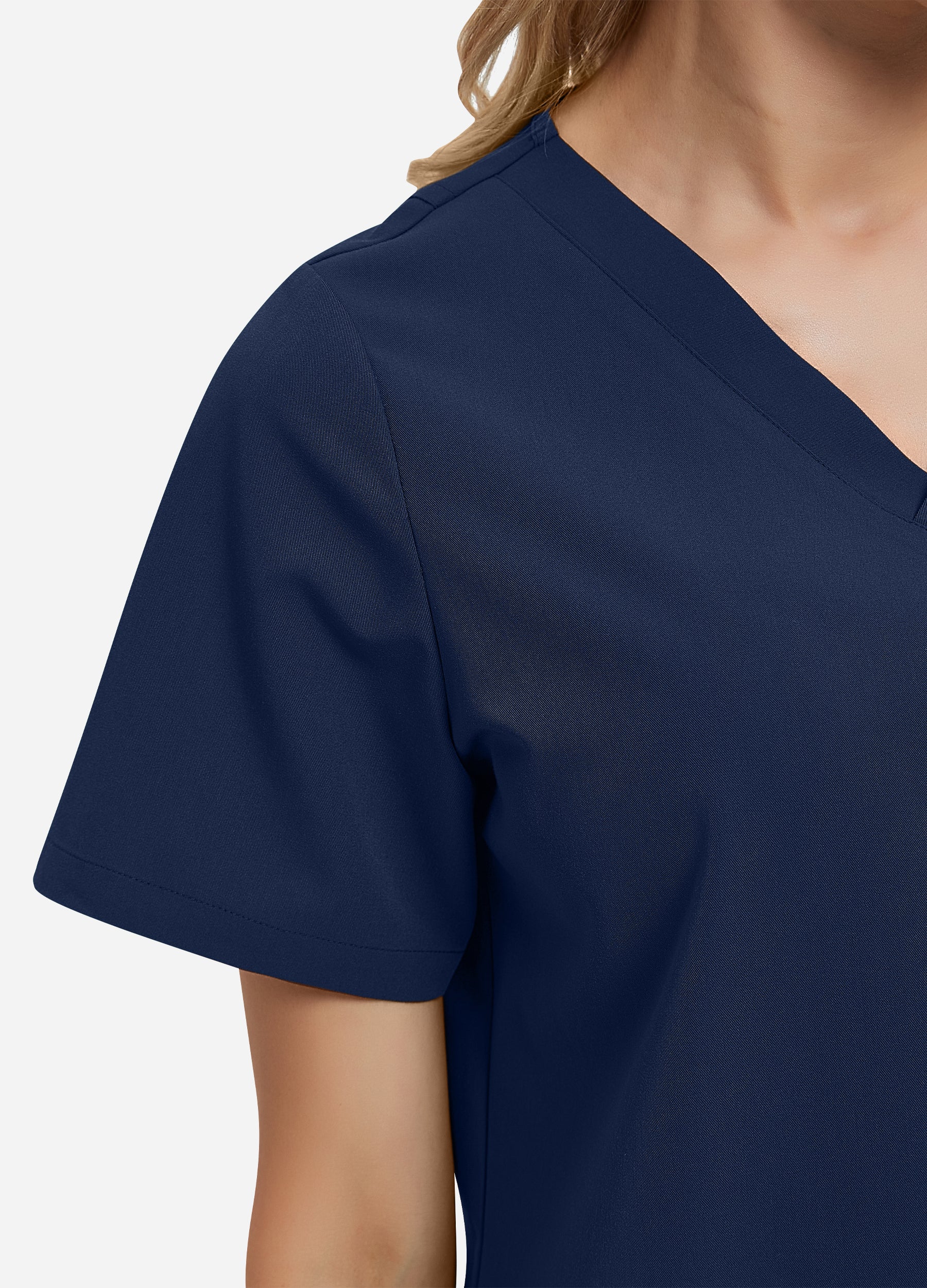 Blusa médica de 4 bolsillos con escote en V para mujer