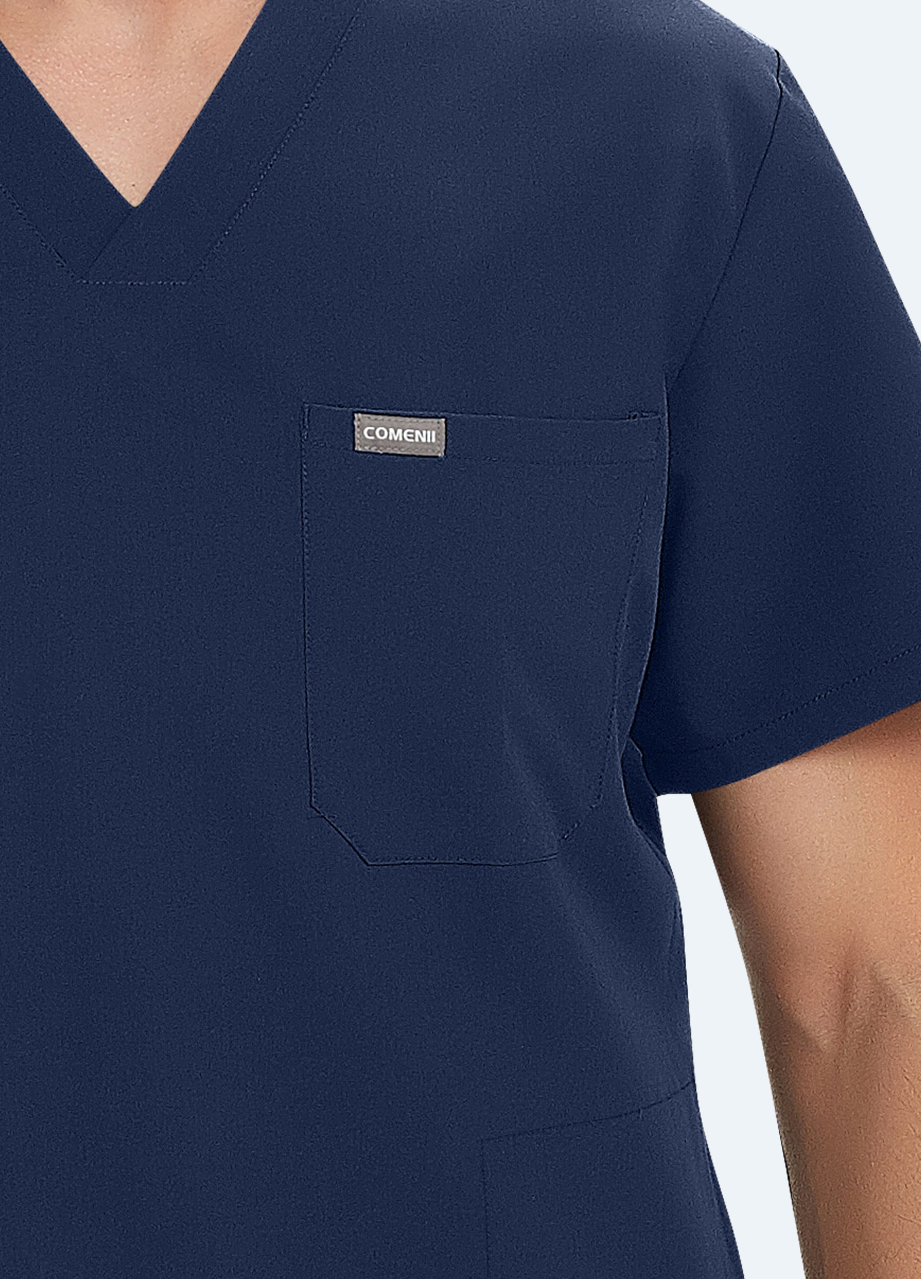 Blusa médica a medida con escote en V y 3 bolsillos para hombre