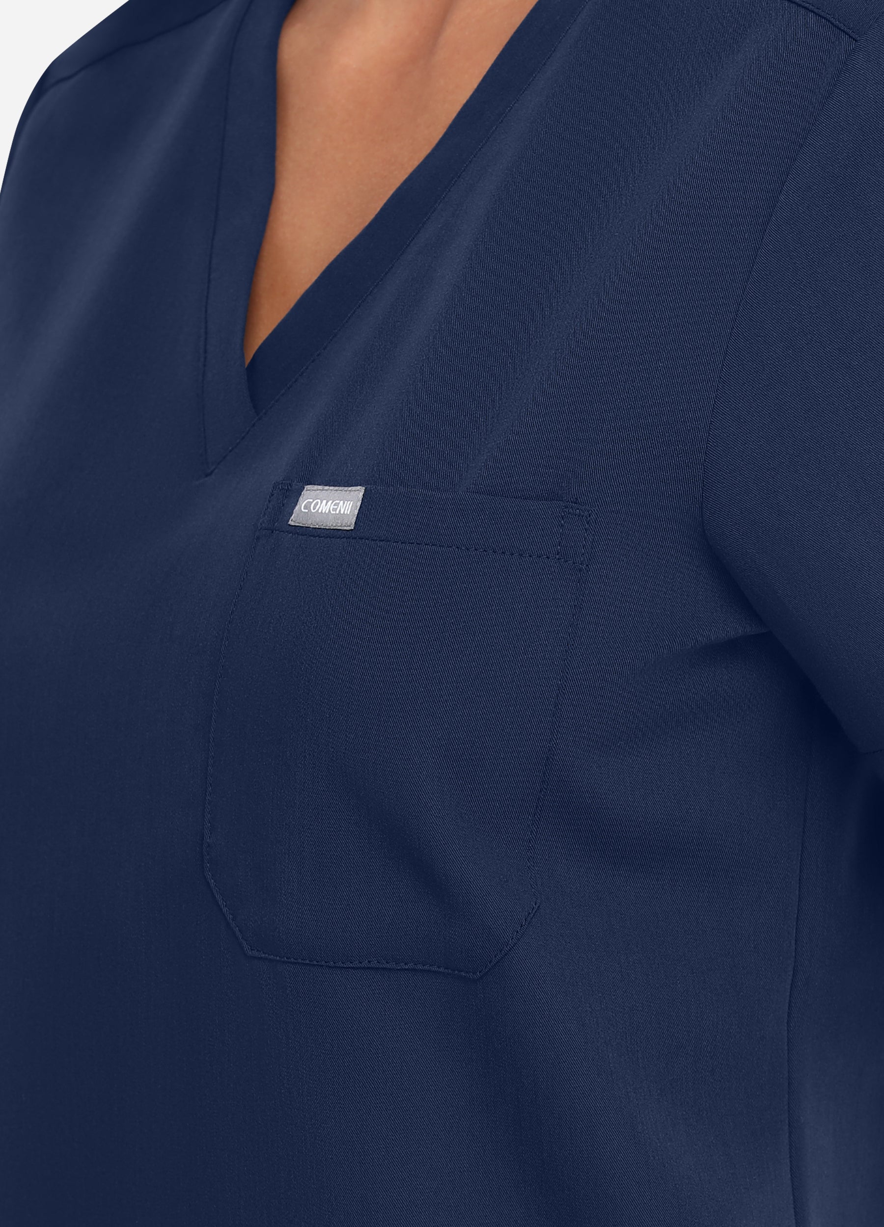 Blusa médica moderna con 1 bolsillo para mujer