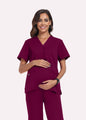 Wine Red SoftTouch™ maternity scrub top front fit with hands on baby bump by COMENII