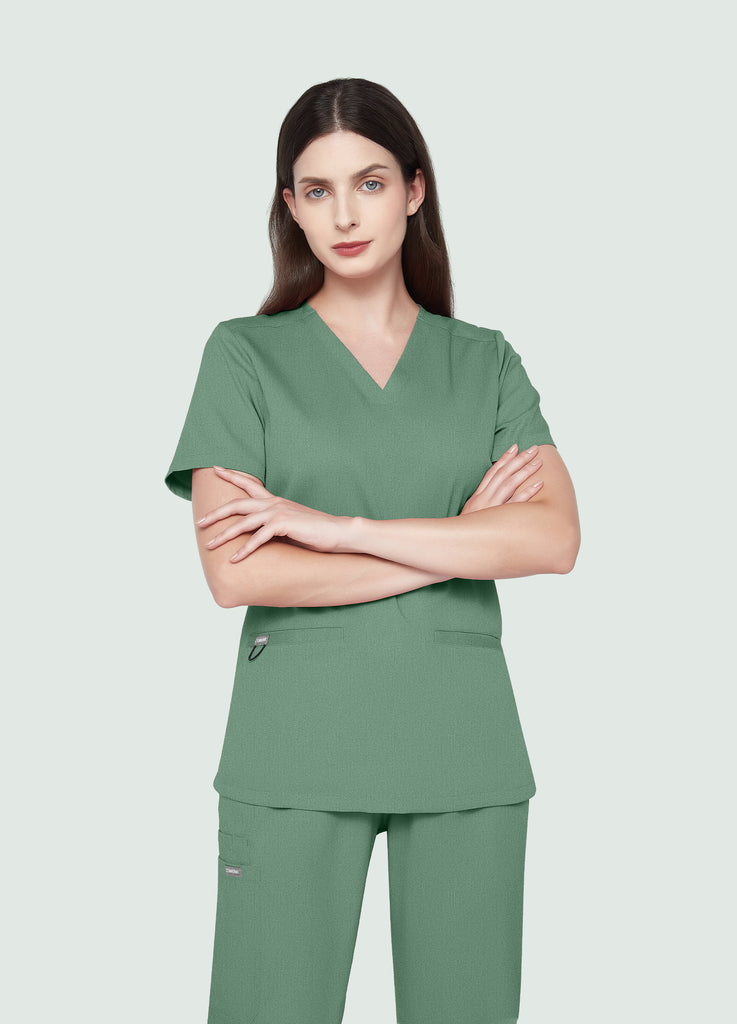 Blusa médica entallada con escote en V y 3 bolsillos para mujer