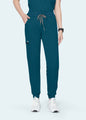 Caribbean Blue StyleFlex™ women's jogger scrub pants on model, front fit by COMENII