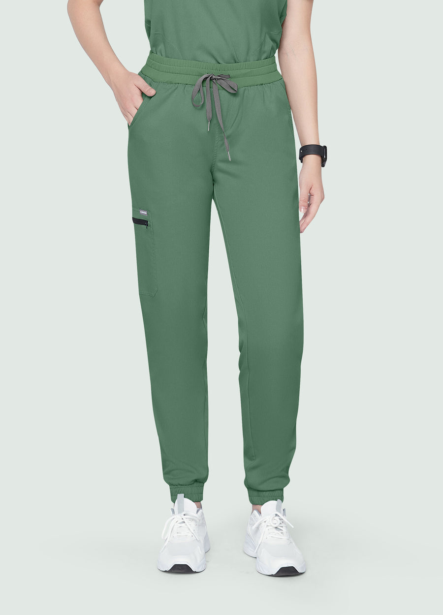 Moss StyleFlex™ women's jogger scrub pants on model, front fit by COMENII