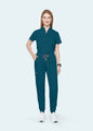 Caribbean Blue StyleFlex™ women's jogger scrub pants with matching scrub top, full-length view by COMENII