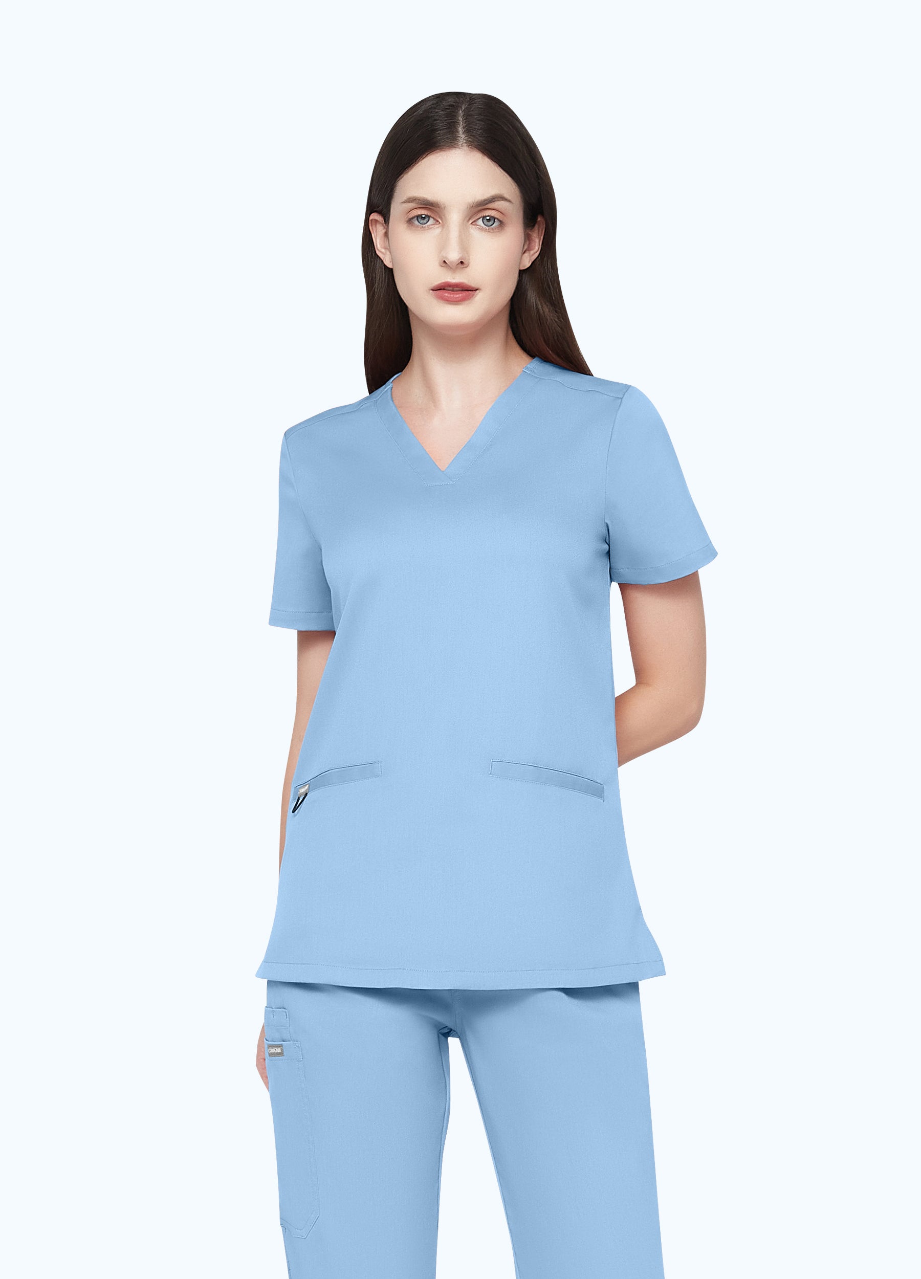 Blusa médica entallada con escote en V y 3 bolsillos para mujer