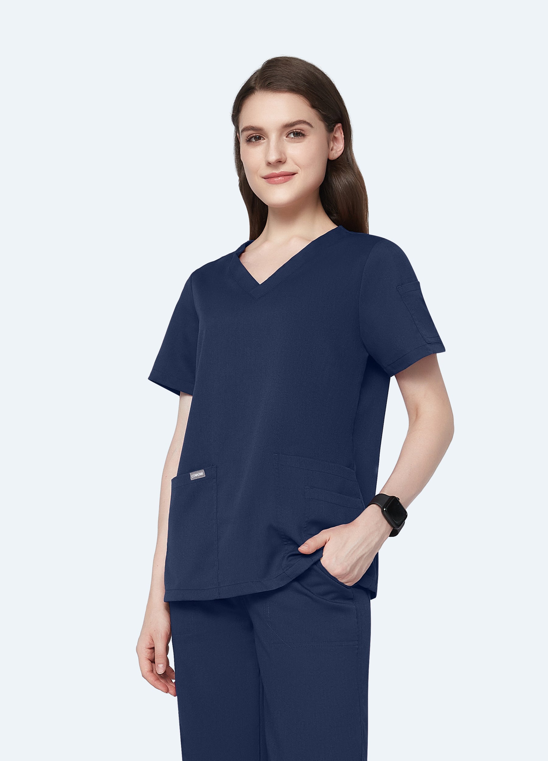 Blusa médica de 4 bolsillos con escote en V para mujer