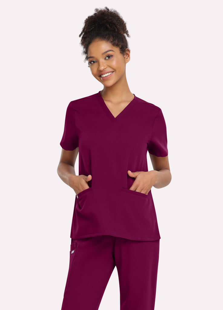 Blusa médica entallada con escote en V y 3 bolsillos para mujer