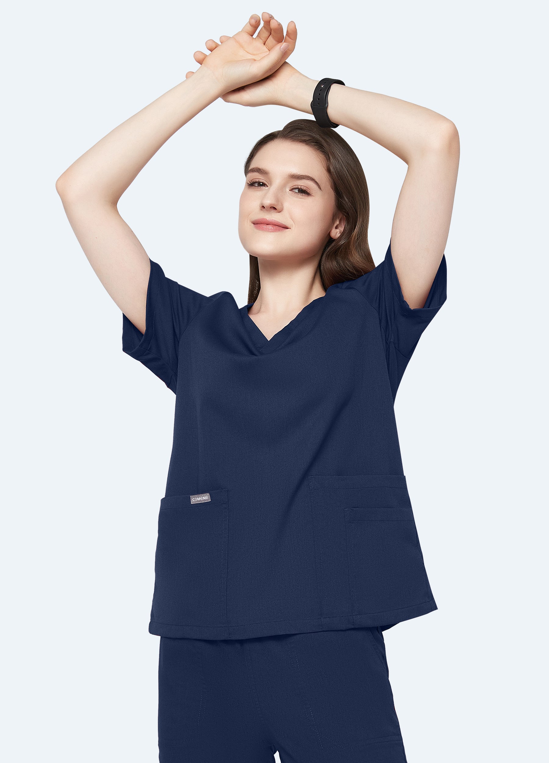 Blusa médica de 4 bolsillos con escote en V para mujer