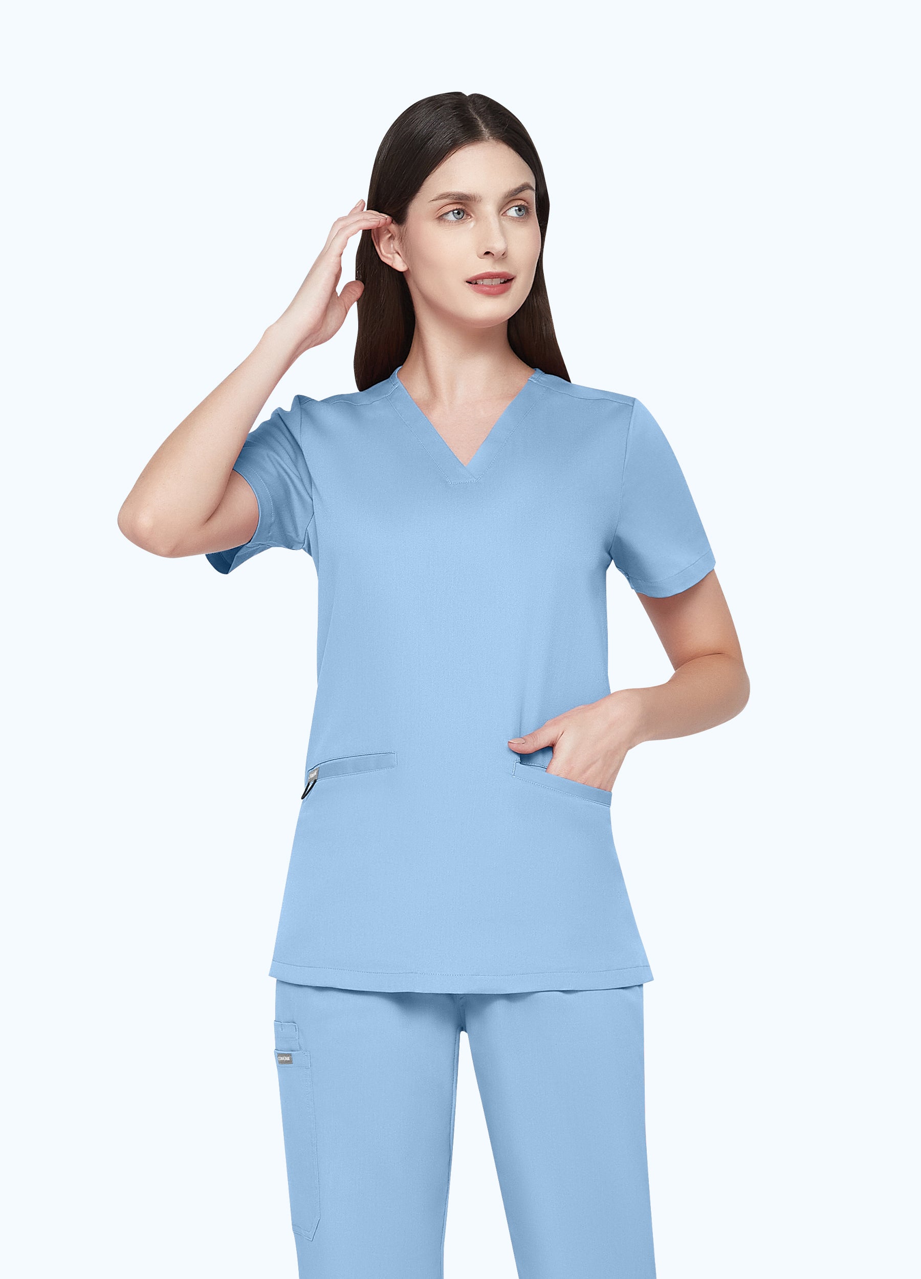 Blusa médica entallada con escote en V y 3 bolsillos para mujer