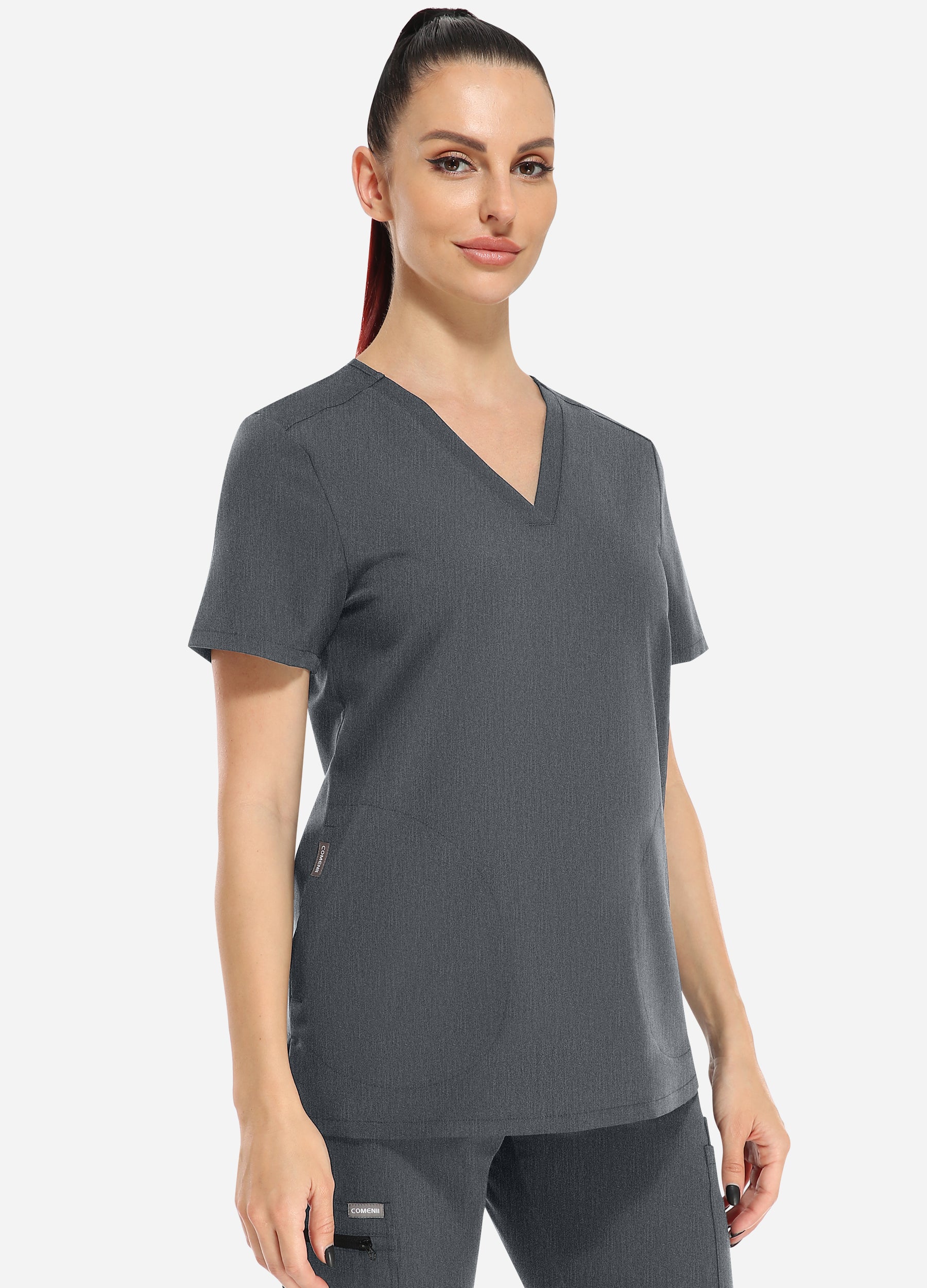 Blusa médica básica con 2 bolsillos y cuello en V para mujer