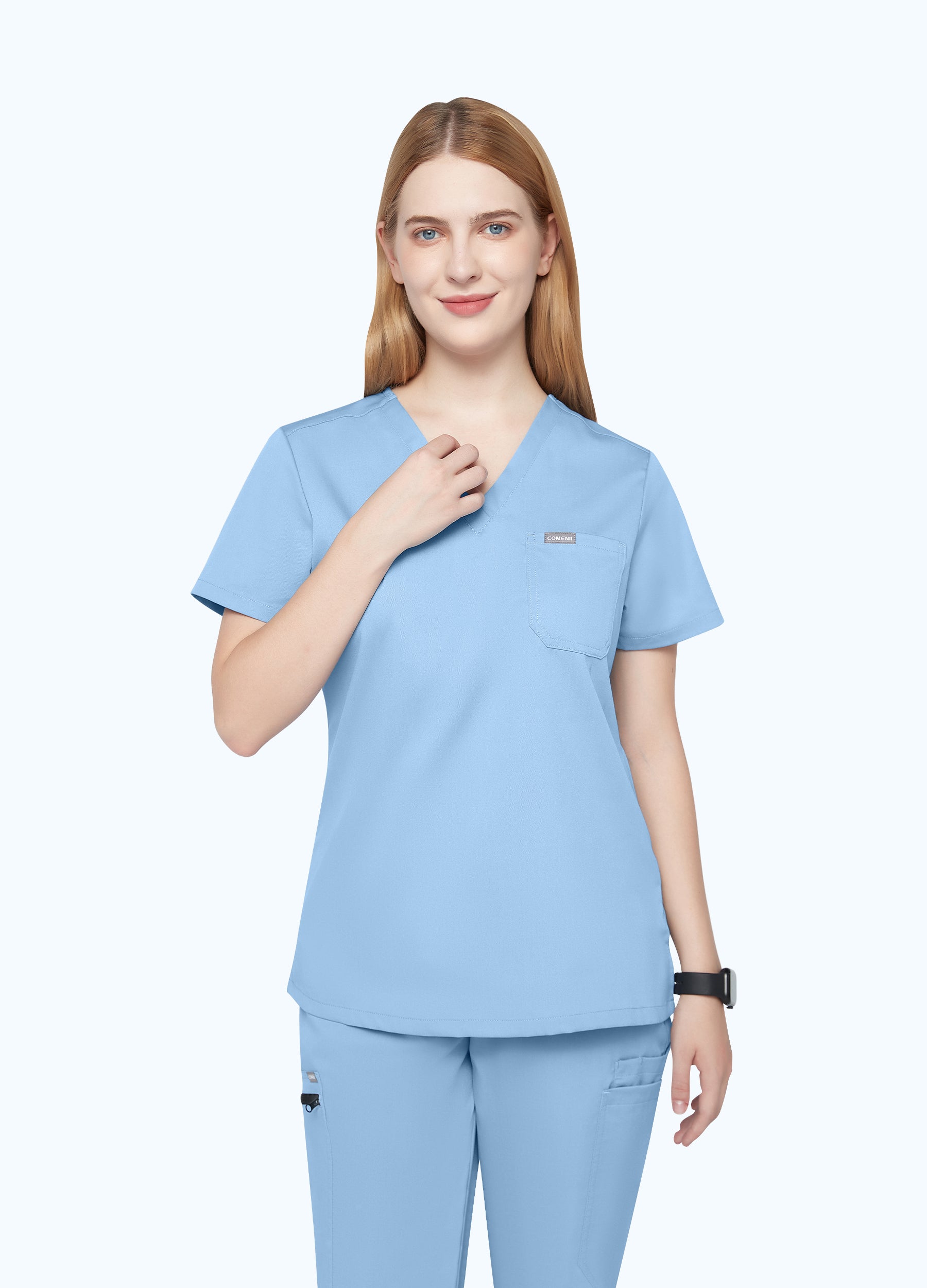 Blusa médica moderna con 1 bolsillo para mujer