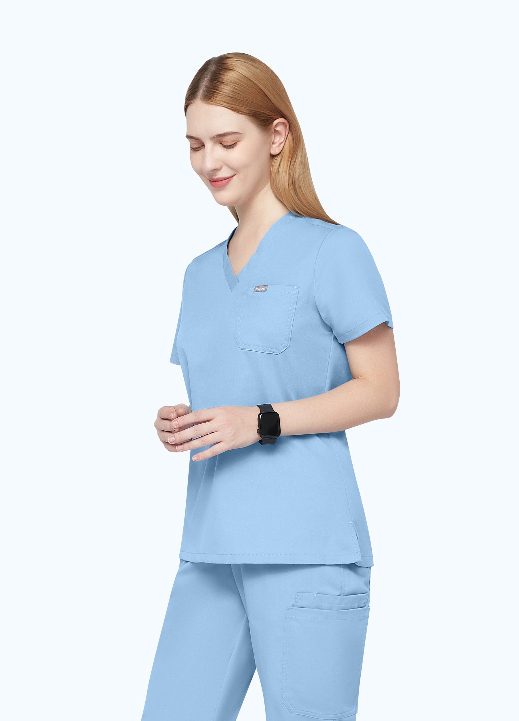 Blusa médica moderna con 1 bolsillo para mujer