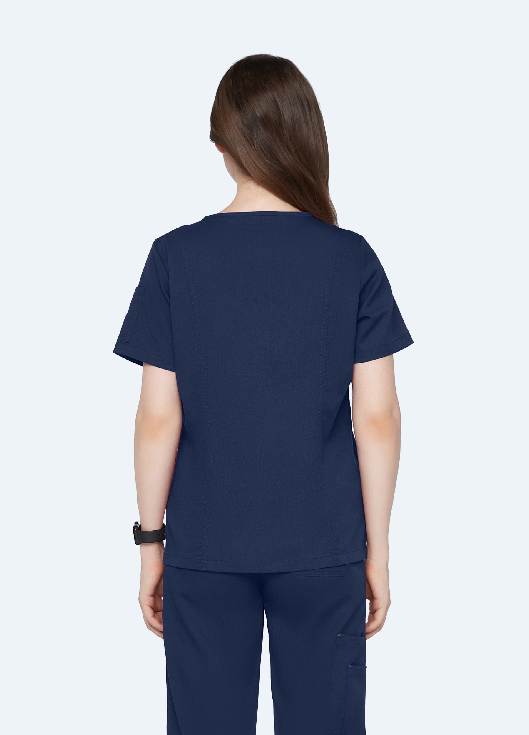 Blusa médica de 4 bolsillos con escote en V para mujer