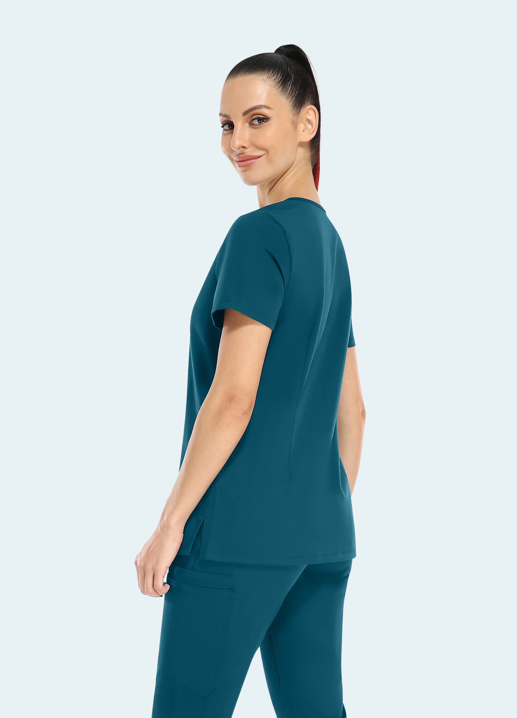 Top scrub basic da donna con 2 tasche e scollo a V