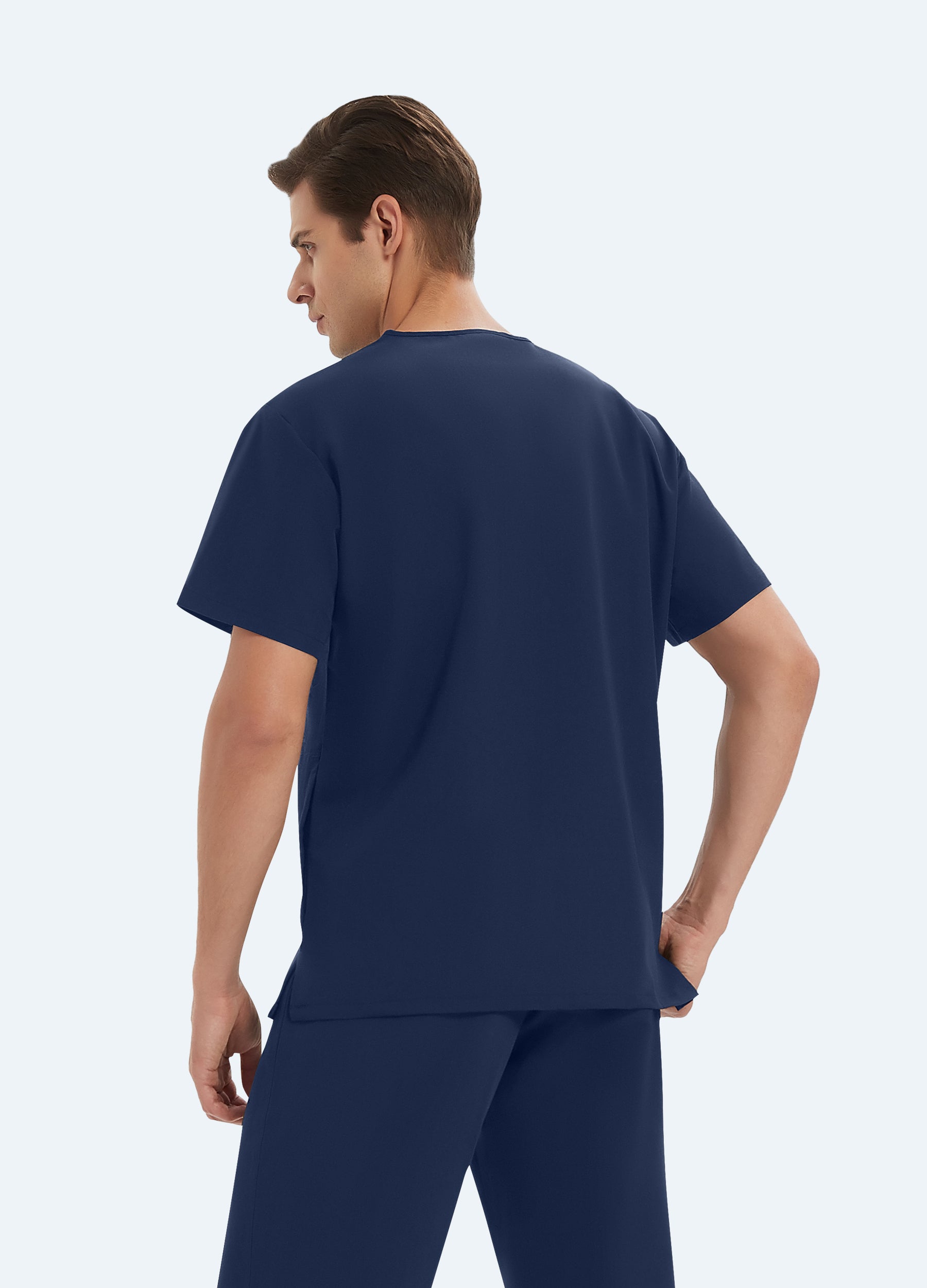 Blusa médica a medida con escote en V y 3 bolsillos para hombre