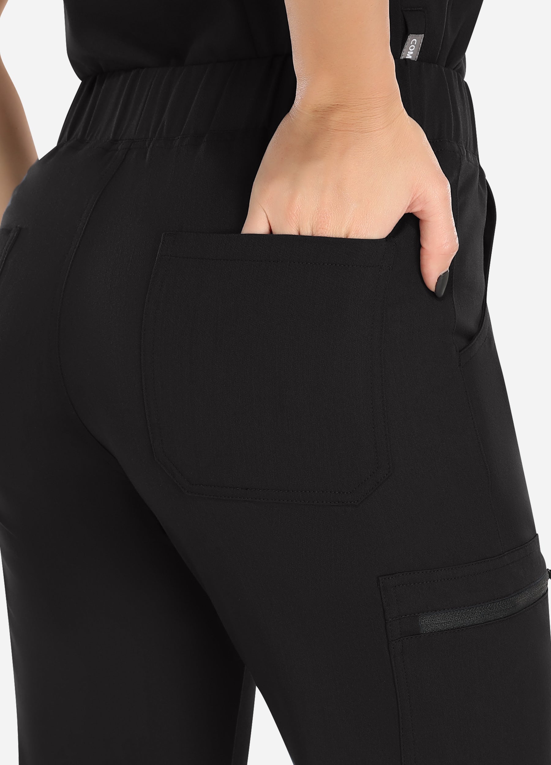 Pantalón médico cónico de 8 bolsillos para mujer